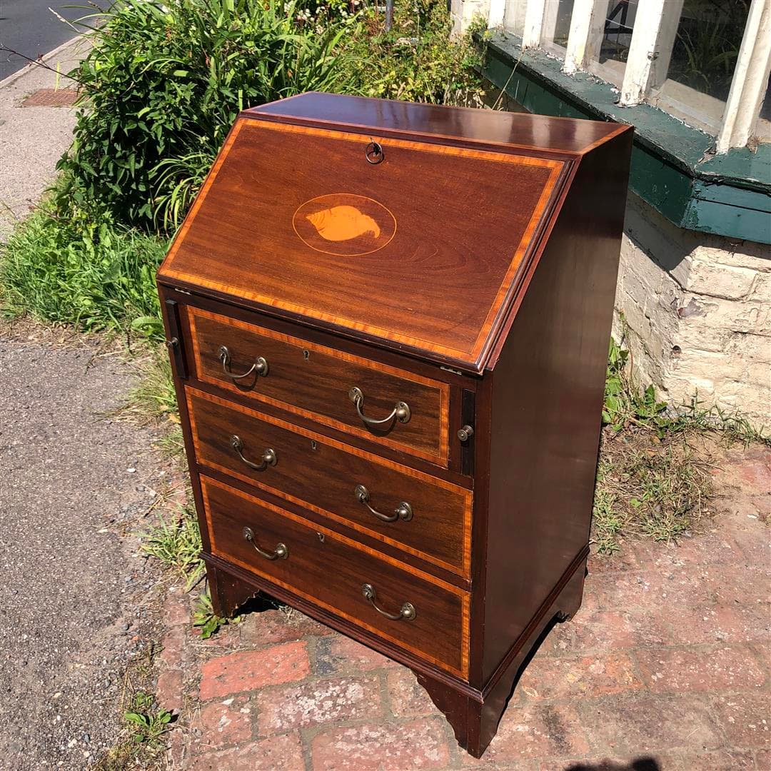 Small antique mahogany veneer bureau with drawers below 1920s