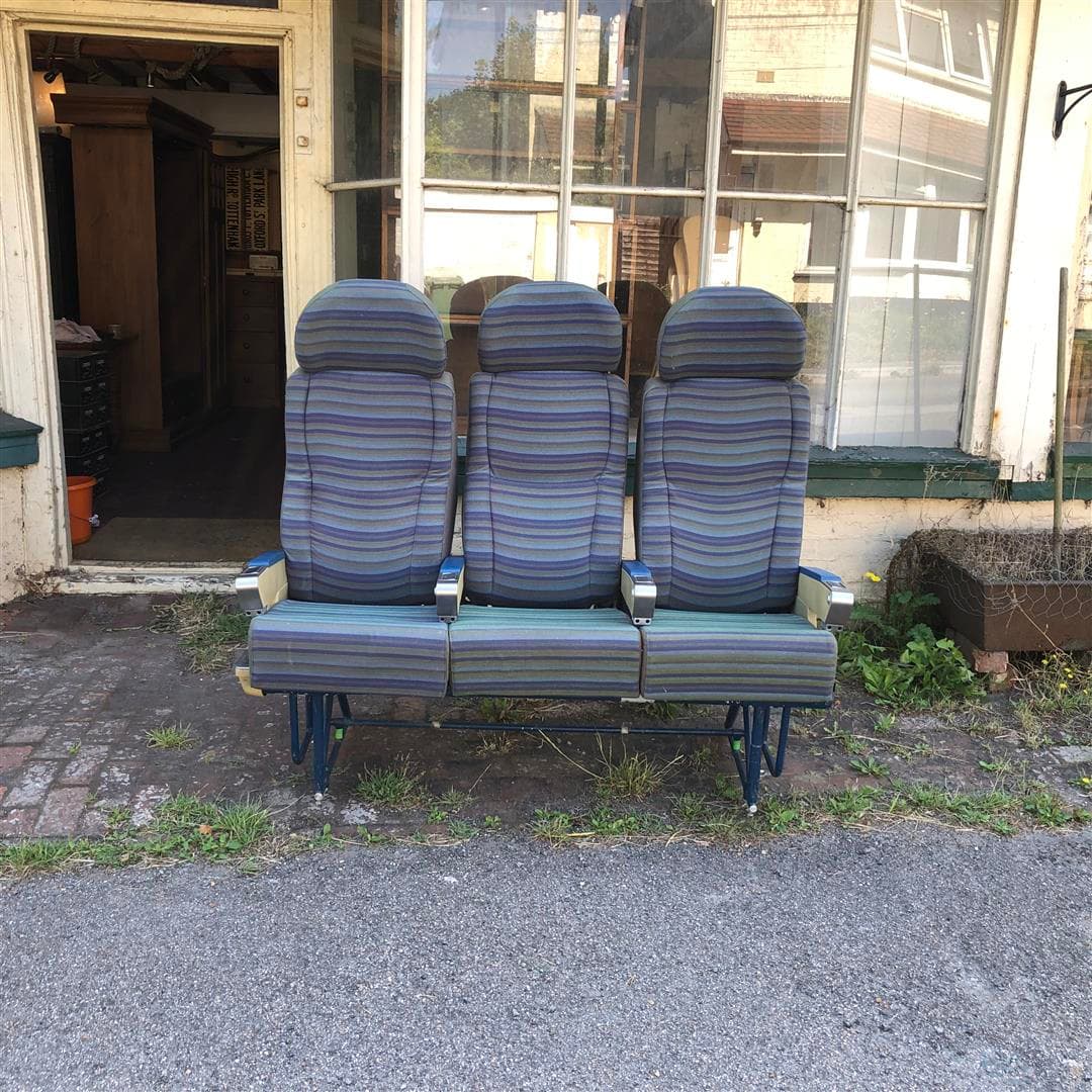 Set of aeroplane seats originally from a 1960s Vickers VC10 good cinema seats